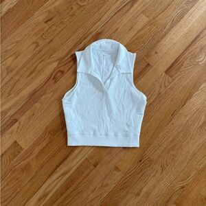 Travis Mathew white ribbed crop top polo